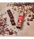 Foto creativa de barrita de chocolate negro ecológico al 82%